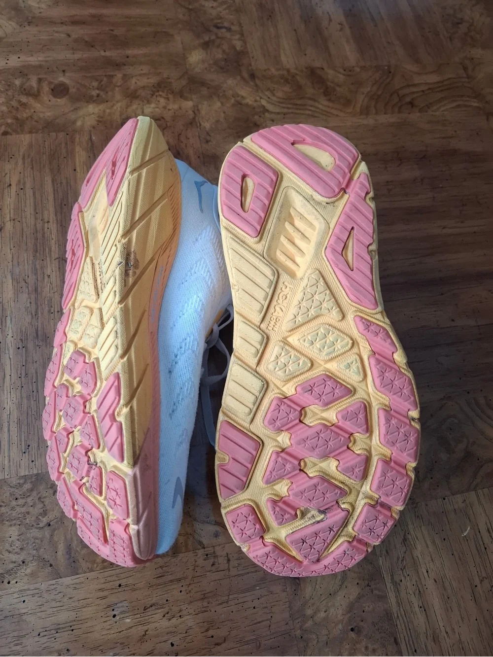 Hoka Women's White Running Shoes with Peach and Yellow Gradient Sole
